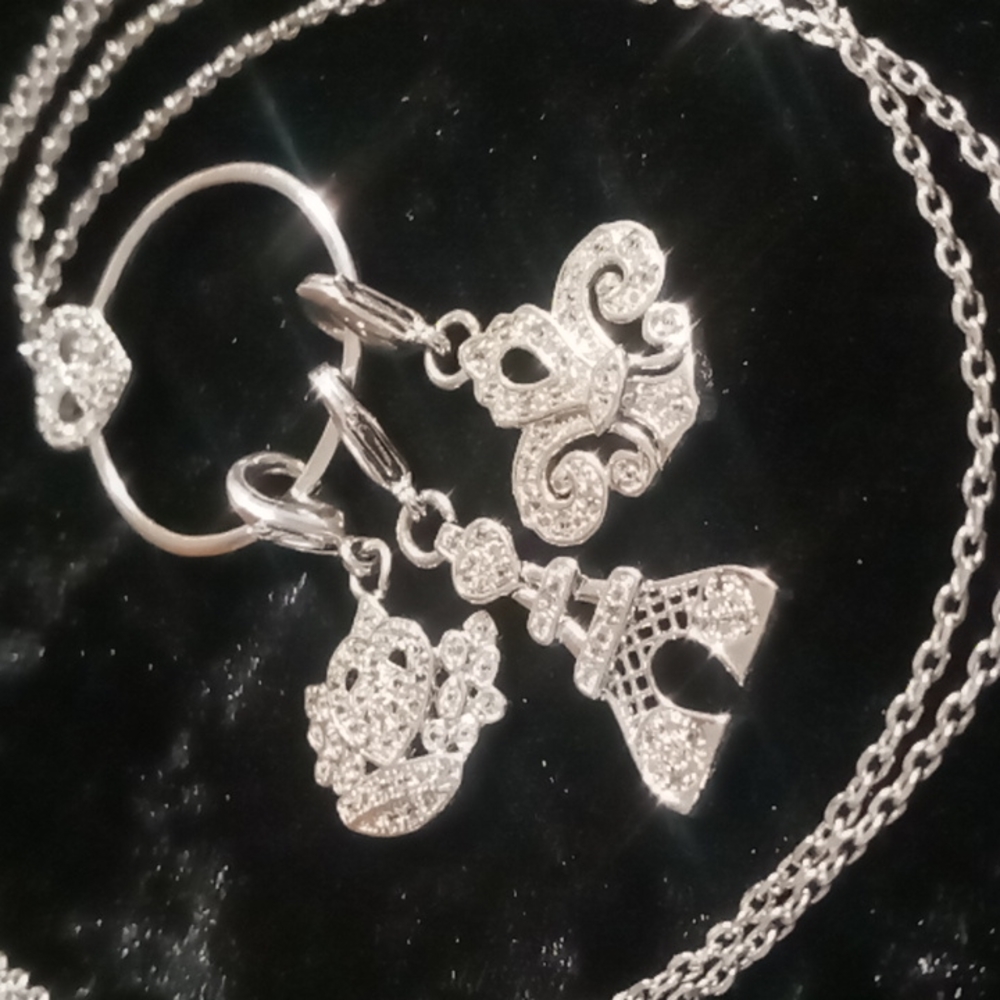 STS KARIS long charm necklace.28 inches long .